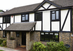 uPVC Windows finished in Black/brown laminate uPVC Windows finished in Black/brown laminate