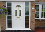 Entrance door with glazed side panels