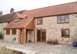 Golden Oak windows and doors in a stone cottage